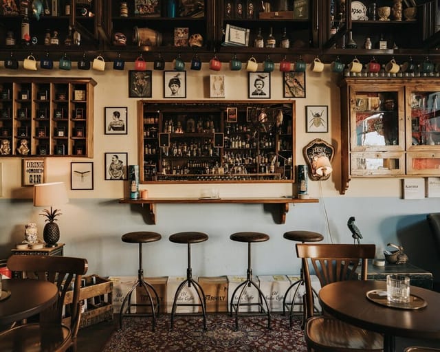 Intimate Milano lounge club for VIP receptions and networking events with quirky decor.