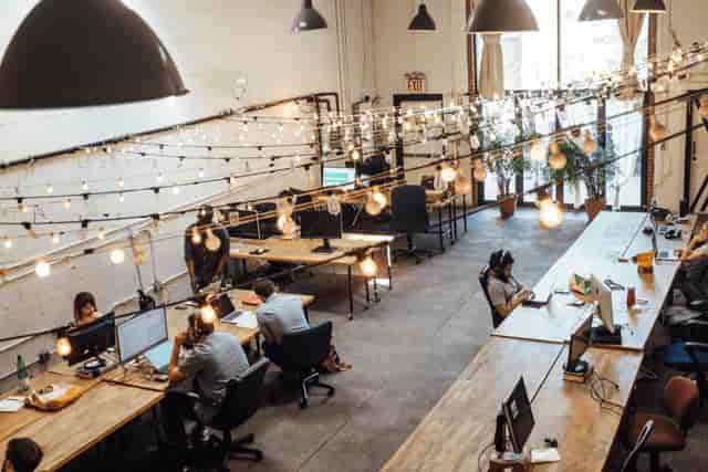 Industrial-chic open coworking space in Milan for collaborative offsite and creative workshop.