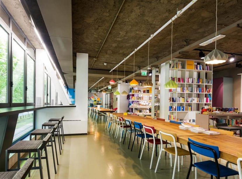 Open Milano bookstore coworking space for workshops and networking sessions.