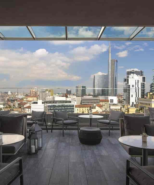 Radio Rooftop Bar Milan: Premium lounge seating with skyline views for cocktail and networking events.