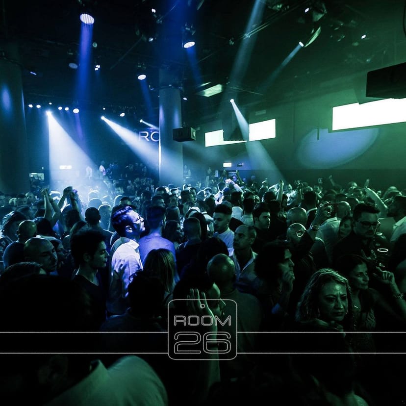 Modern cocktail bar in Studio 26 with dramatic lighting for corporate events and nightlife.