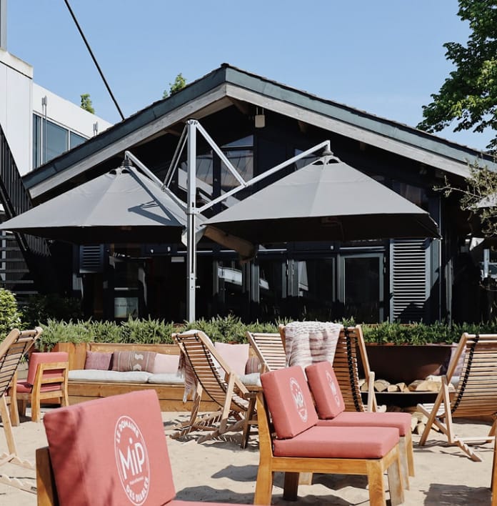 Modern Beach House breakout space for corporate networking and outdoor events.