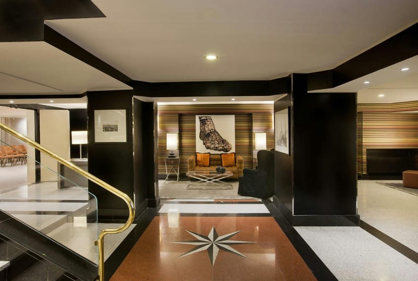 Starhotels Ritz lobby, geometric flooring, ideal for VIP meetings and corporate event registration.