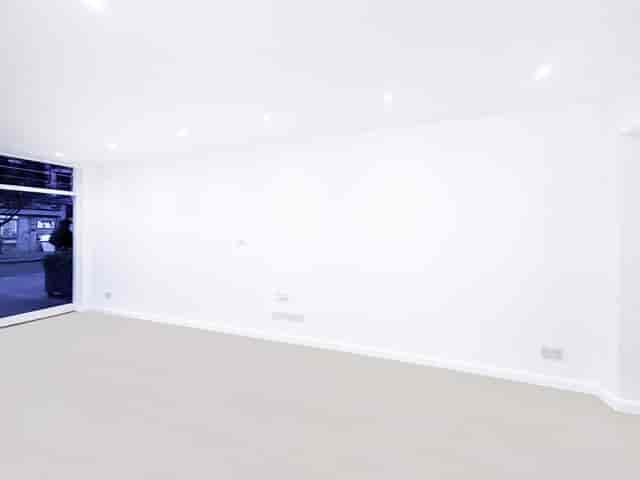 Minimalist Purist Gallery venue for art installations and branding events.