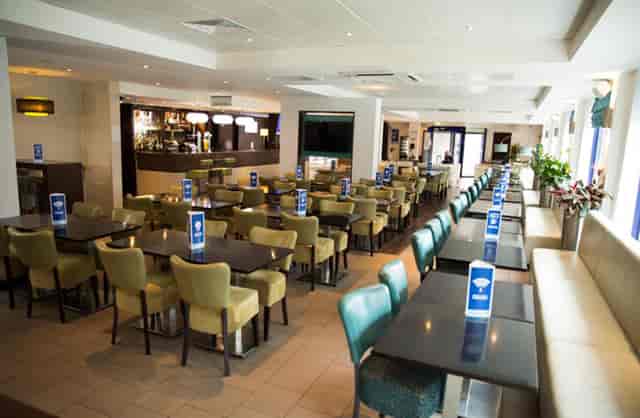 Modern Bridges Suite meeting space with modular seating for corporate events and workshops.