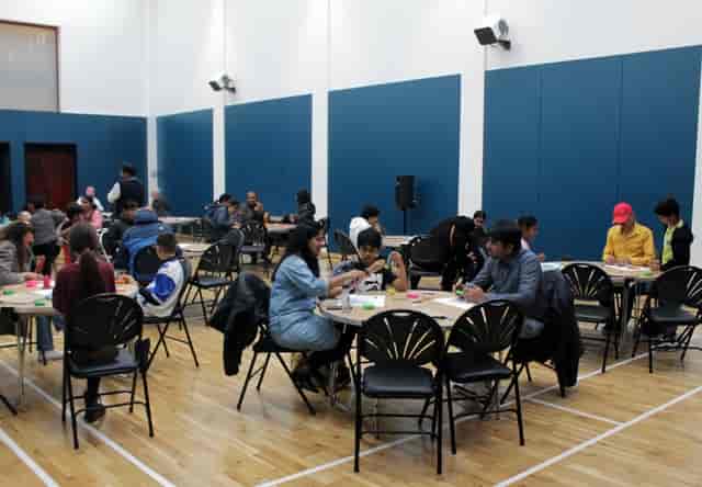 Lively workshop setup in Sports Hall, Pyramid at Anderston, ideal for networking events.