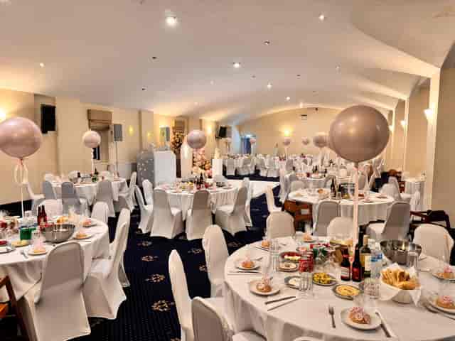 Aphrodite Suite banquet setup with balloon centerpieces for Greek events and social celebrations.
