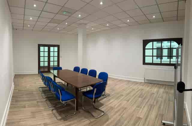 Athena Suite boardroom for corporate meetings and team brainstorming at The Midlands Greek Centre.