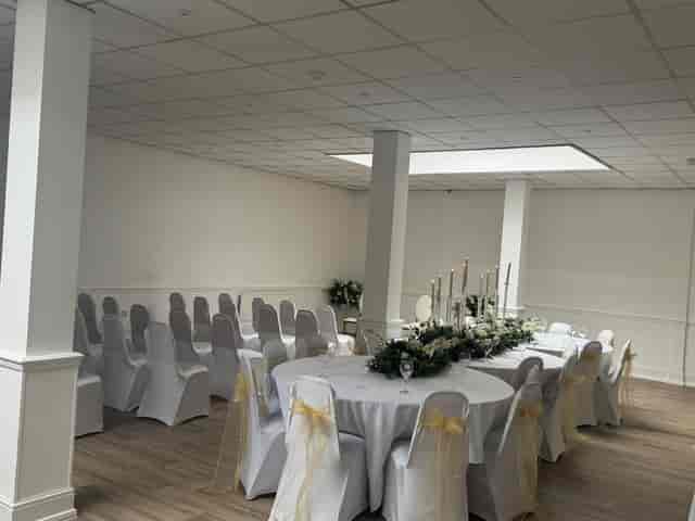 Apollo Suite banquet hall with neutral decor for weddings and formal event receptions.