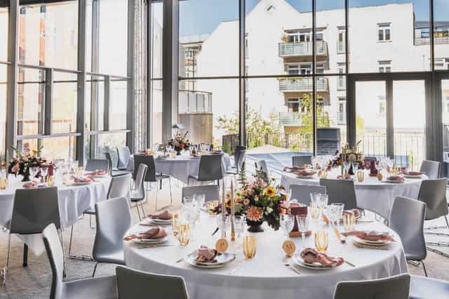 Royal Oak event space at 1 Hotel Copenhagen with floor-to-ceiling windows for galas and weddings.
