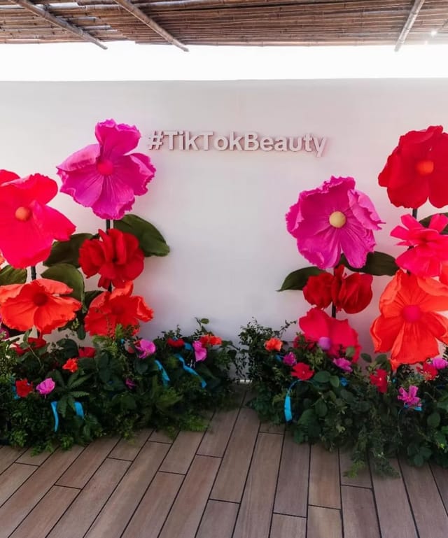 C'est La Vie Private Dining Room with colorful flowers, perfect for events and influencer gatherings.