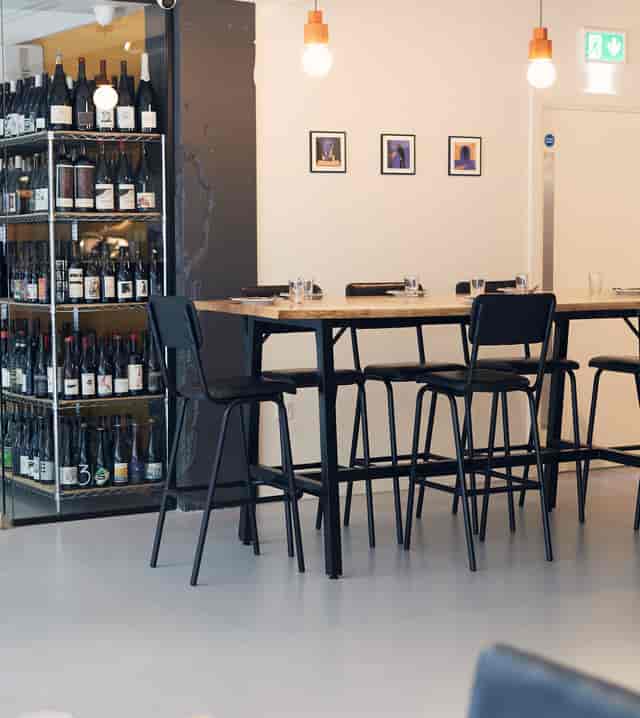 Kitchen bar counter for networking reception and beverage-focused corporate breakout event.