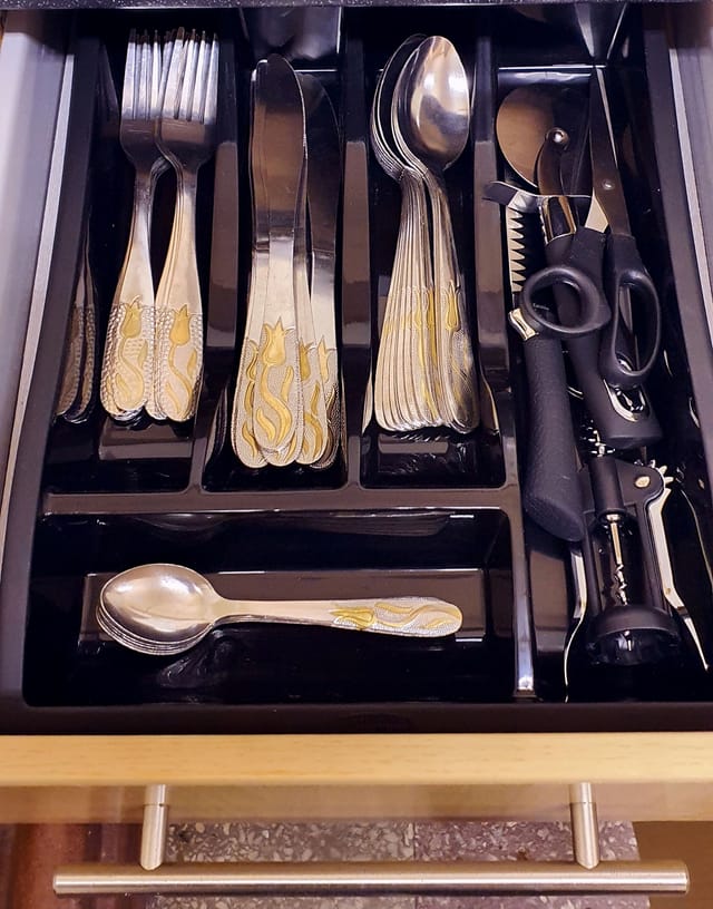 Organized cutlery station for event catering at St Anne's Parish Church, Haughton.