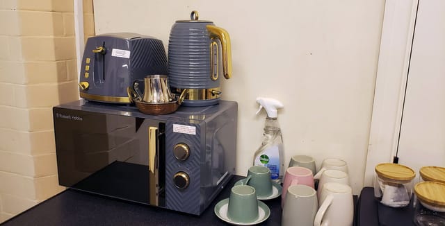 Cluttered break station at St Anne’s Parish Room, Haughton for church event catering.