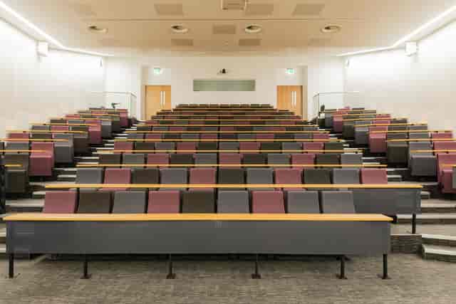 Tiered Lecture Theatre 2.008 with workstation desks for business workshops and plenary lectures.