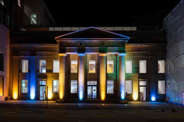Grosvenor Building theatre with architectural lighting for luxury gala or evening reception.