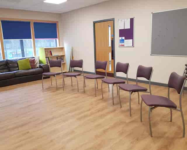 Teddy Webb Hall breakout space with linear chair seating for professional event hire.