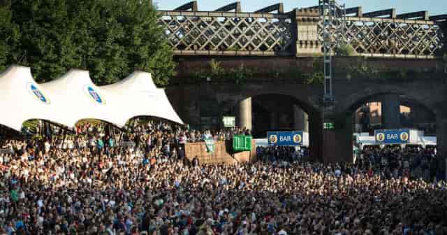 Castlefield Bowl outdoor concert venue, industrial backdrop, crowd management and event facilities.