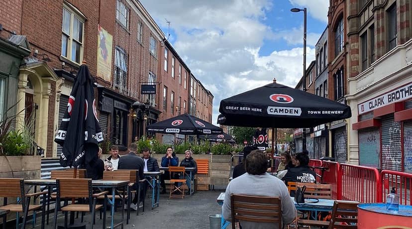 Casual open-air bar at Wolf At The Door, perfect for informal networking events and off-sites.