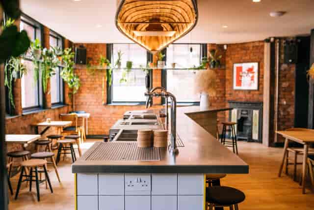 Industrial brick bar for boutique networking events and team workshops.