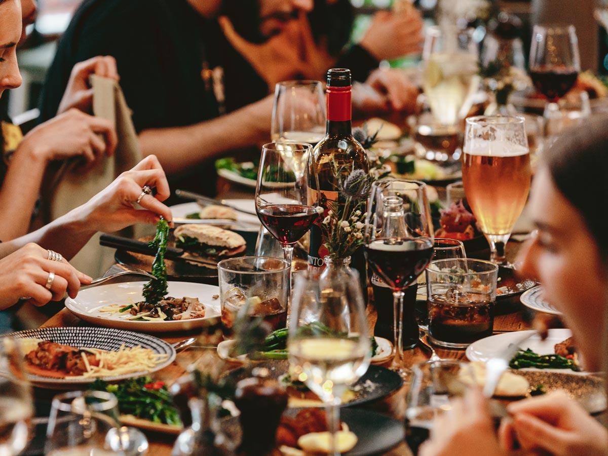 Canto Restaurant dining area with tableside service for corporate dinners and networking events. - Banner