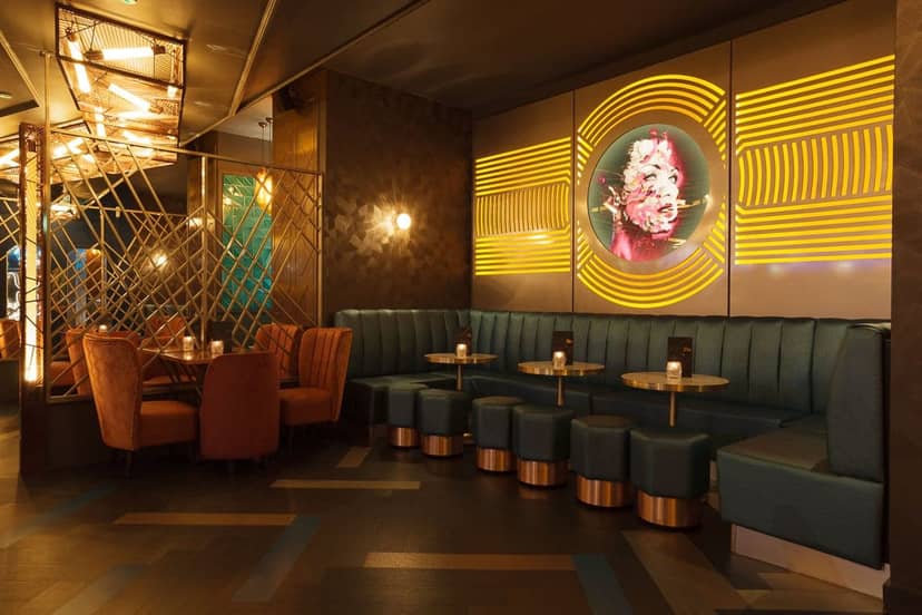Stylish Manchester lounge with banquette seating for VIP networking and cocktail events.