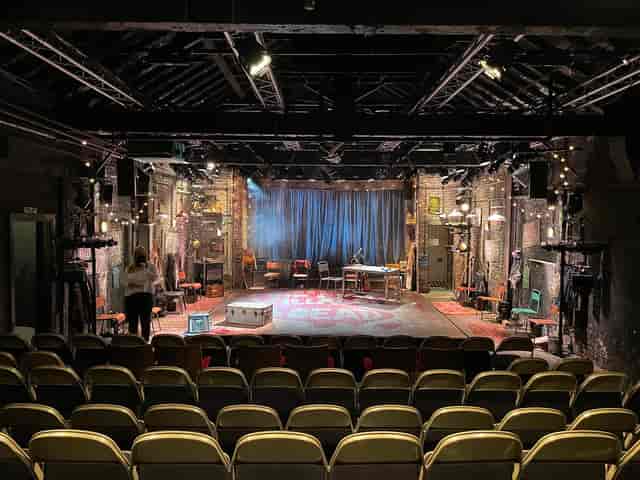 Hope Mill Theatre black-box venue with industrial lighting for corporate events and presentations.