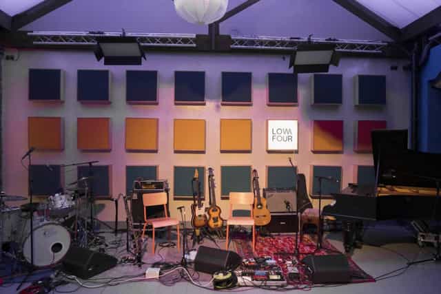 Live room at Low Four Studio with truss lighting for intimate live music performance and events.