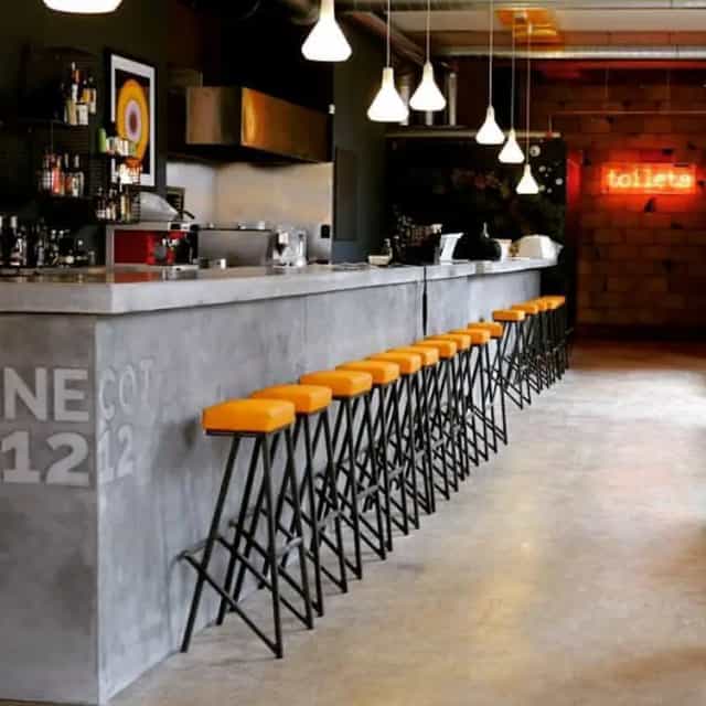 Modern industrial bar at Elnecot, ideal for corporate networking mixers and brand activations.