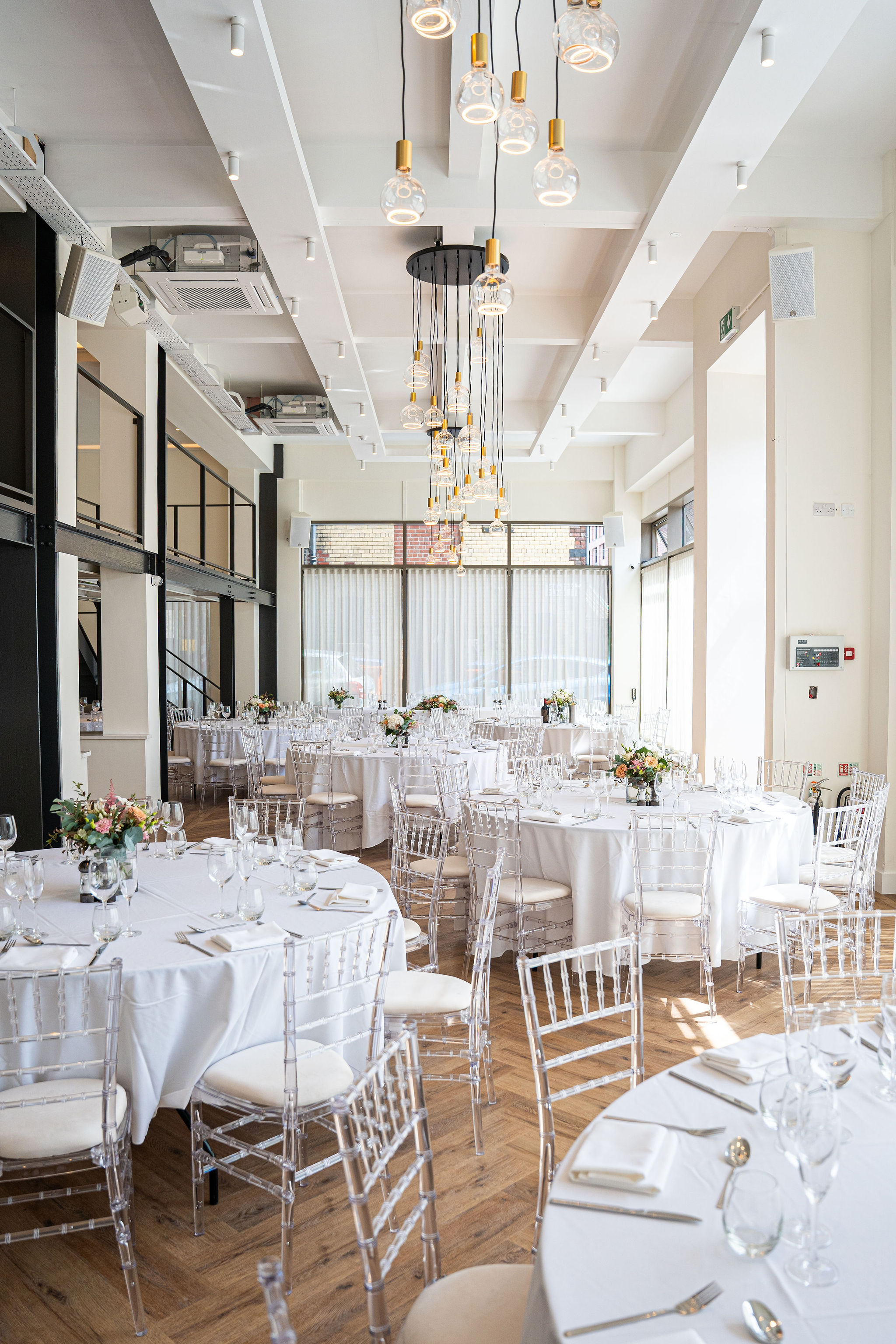 Industrial event space at The Clubhouse Ropewalks, ideal for luxury weddings and corporate galas. - Banner