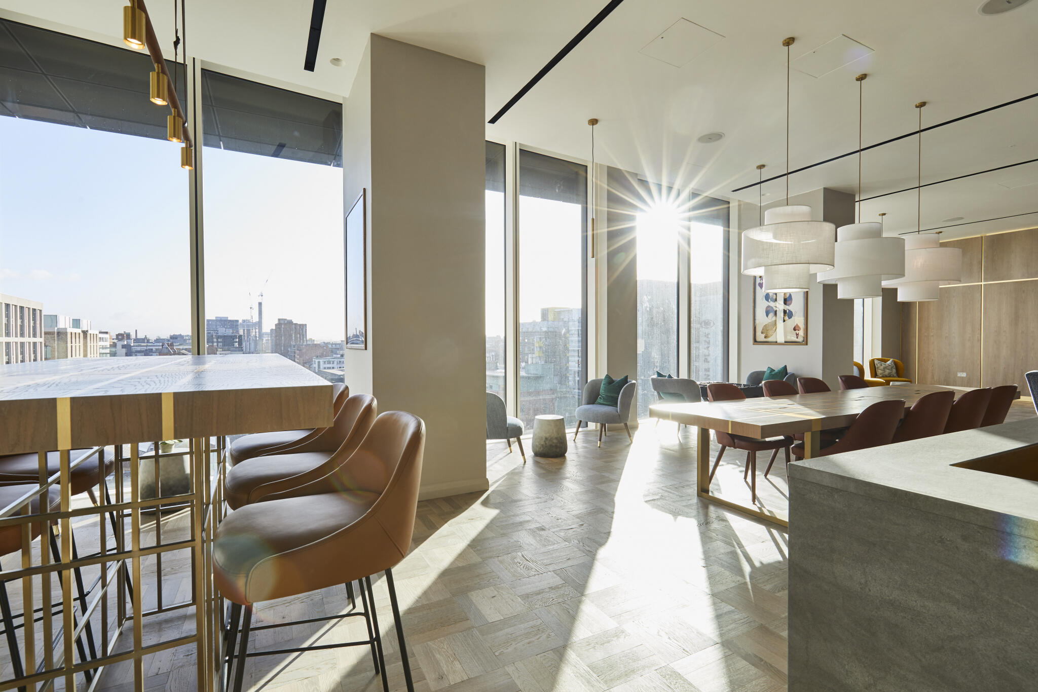 VIP lounge with high-top seating and skyline views for private dining or corporate breakout events. - Banner
