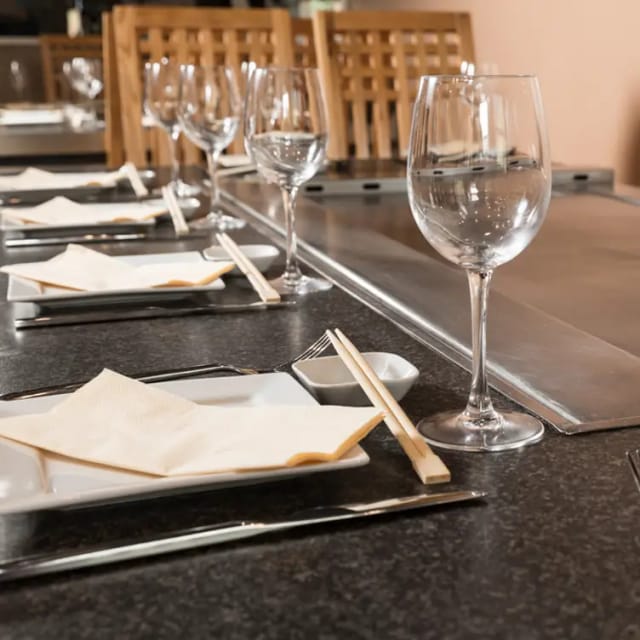 Teppanyaki table set for a corporate dinner in Chinatown, perfect for small group events.