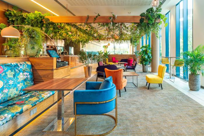 Biophilic terrace at First Street Bar & Kitchen for networking events and corporate coffee breaks. - Banner