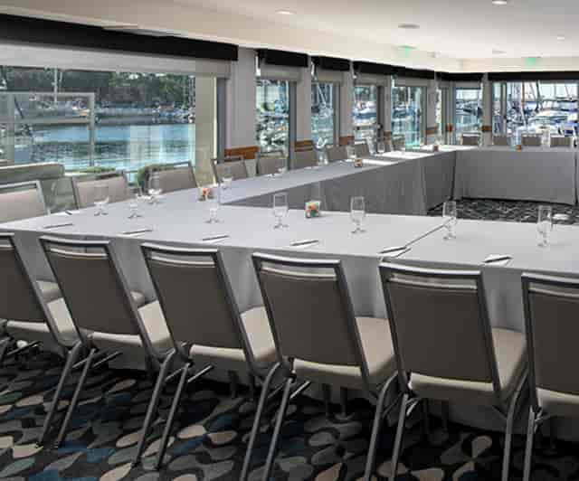 U-shape boardroom at Marina del Rey Hotel with harbor views for corporate events and workshops.