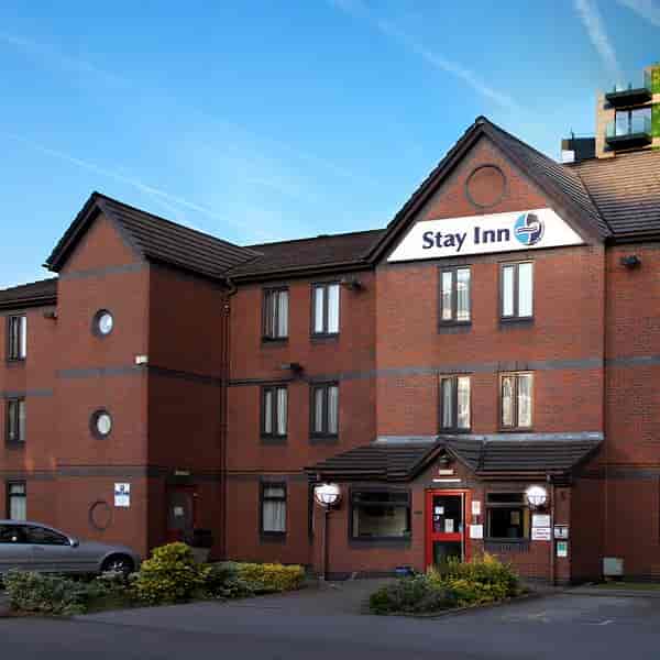 Stay Inn Hotel bar interior for budget contractor housing and low-frills event room blocks.
