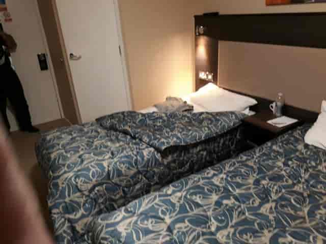 Stay Inn Hotel twin room for event accommodation and site inspection.