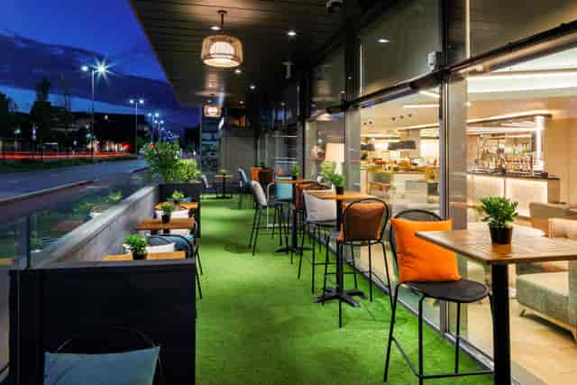 Stylish outdoor terrace at AC Hotel Manchester for networking events and cocktail receptions.