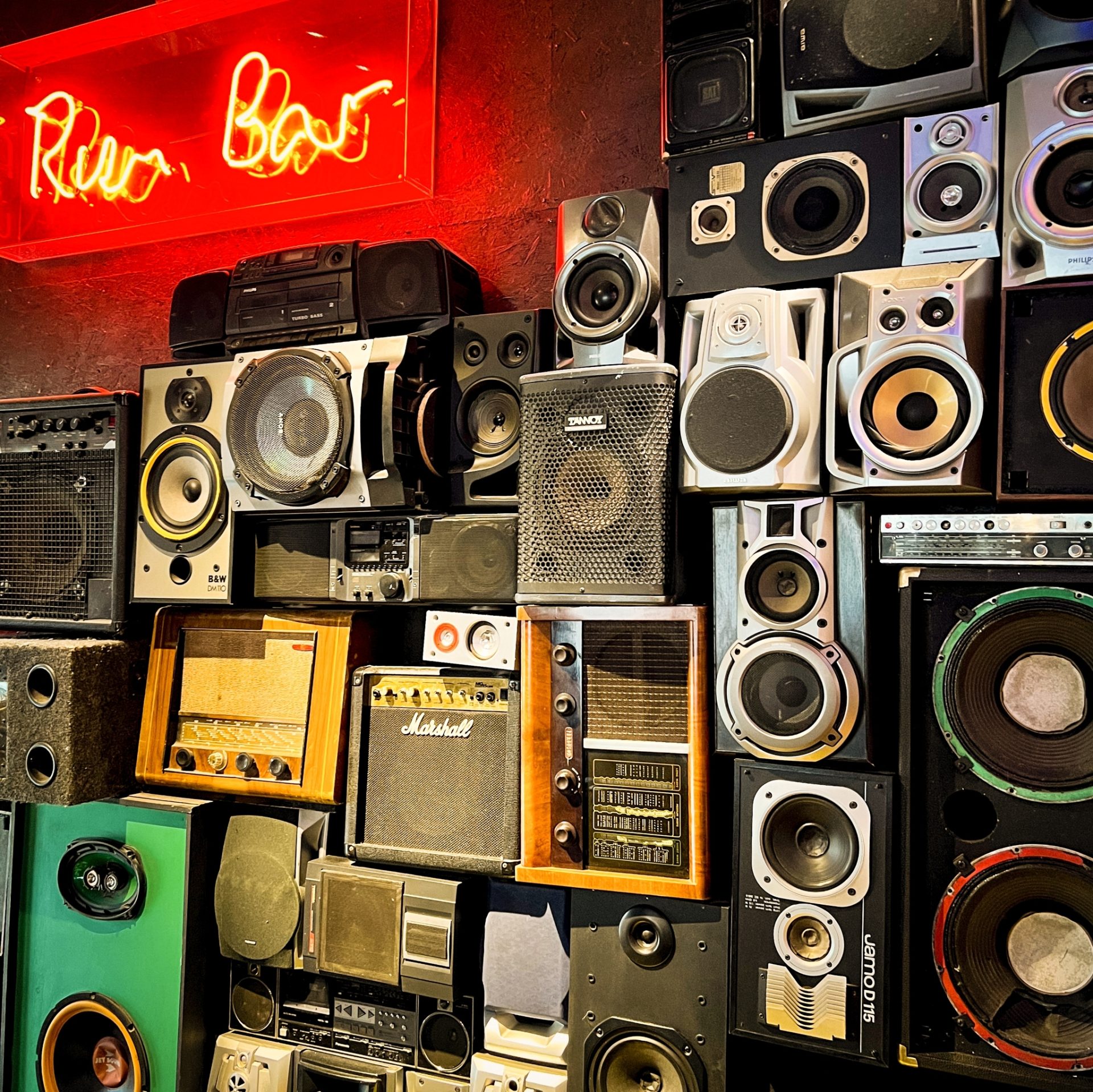 Private seating area with vintage audio equipment for creative music events in Manchester. - Banner