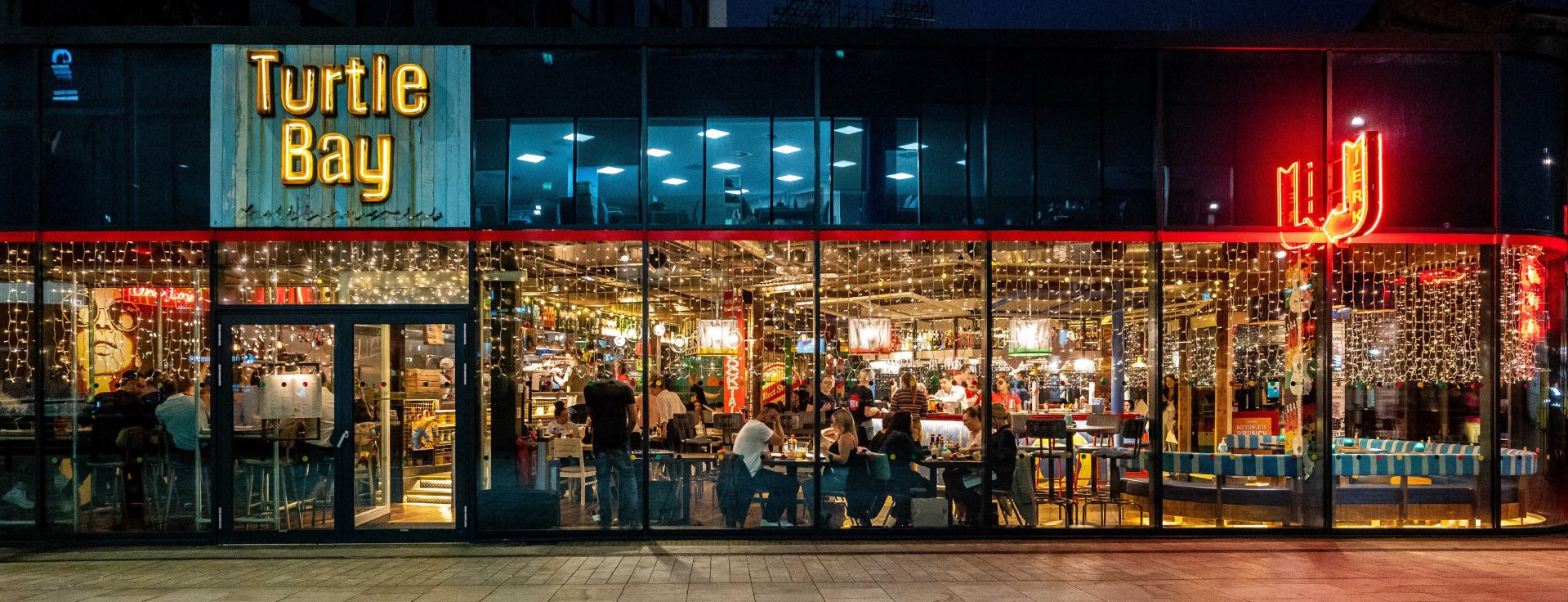 Vibrant Turtle Bay restaurant in Manchester, ideal for networking and social events. - Banner