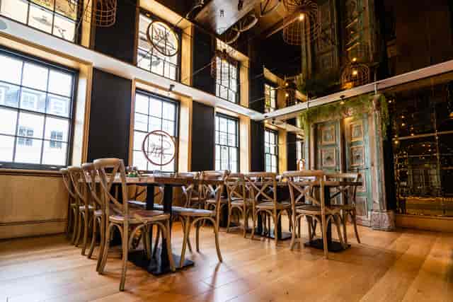 Mowgli Charlotte St private dining room with natural light for corporate luncheons and networking.
