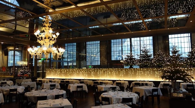 Industrial-chic restaurant bar for upscale corporate gala or seasonal dinner event venue.