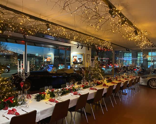 Raclette Chalet holiday banquet event in Zurich with cozy string lighting and premium decor.