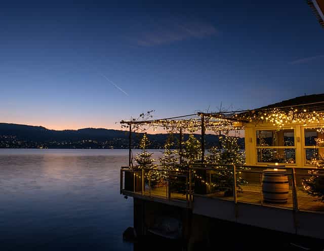 Raclette Chalet Zurich: Cozy waterfront venue for holiday mixers and evening corporate receptions.
