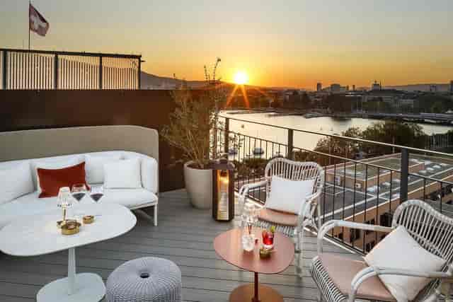 VIEW Rooftop Zurich: Exclusive executive reception venue with stunning sunset waterfront views.