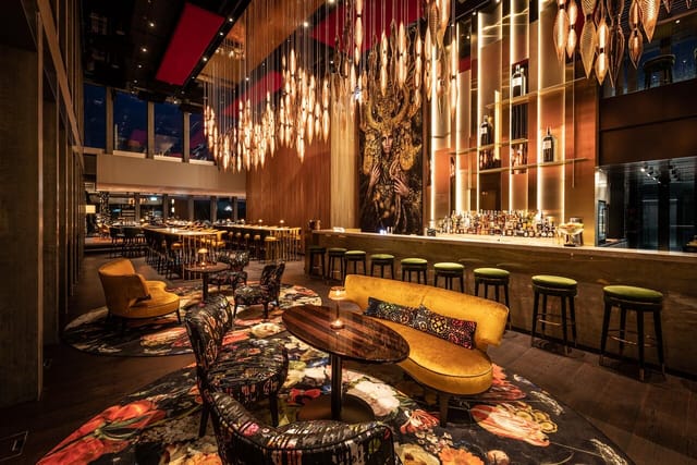 VIP lounge at The Urban with dramatic lighting, perfect for premium receptions and networking.