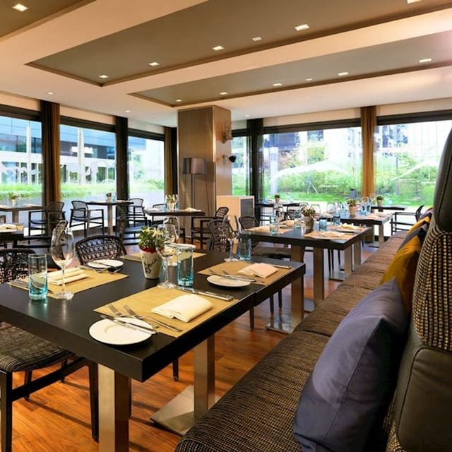 Route 26 Steakhouse dining room with modular seating for business lunch and corporate networking.