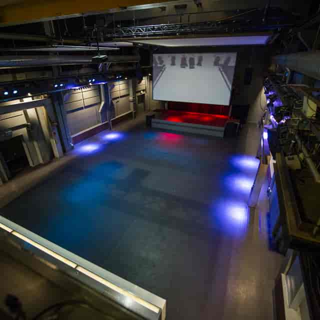 Härterei Club industrial event venue with stage, ideal for corporate conferences and receptions.