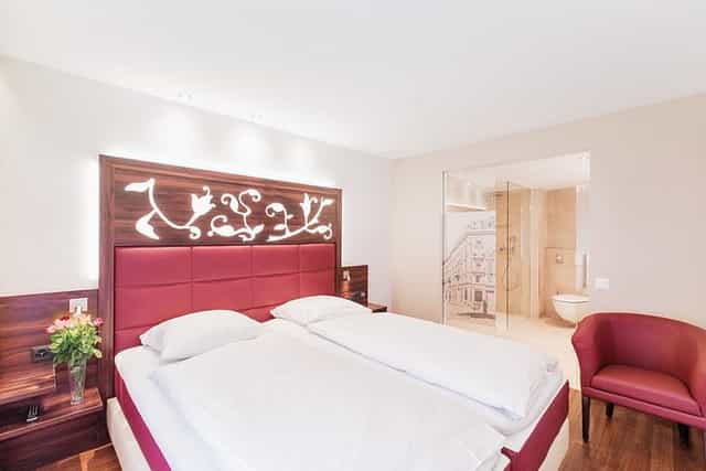 Modern Hotel Scheuble executive suite featuring open-concept layout for business travel.