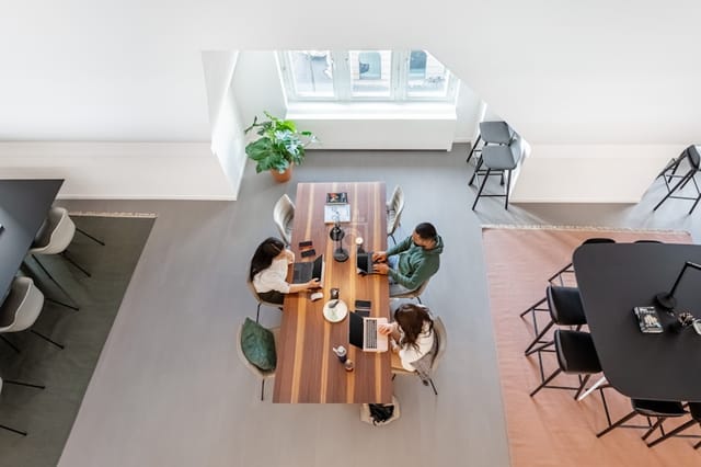 Coworking space at Spaces Seefeld with boardroom table for collaborative meetings and networking.