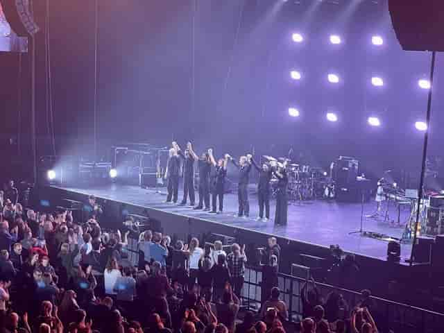 Kanye West bowing on stage at Hallenstadion Zurich live concert event.